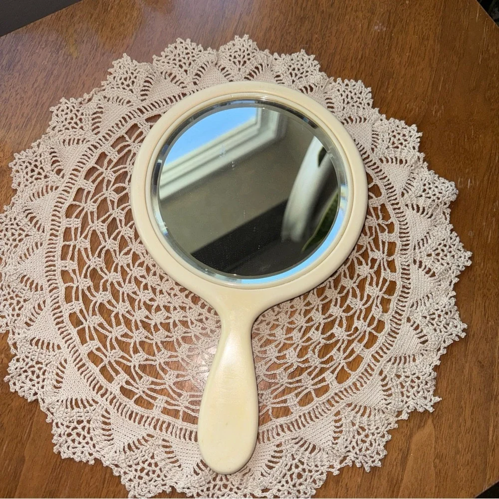 Vintage Art Deco Vanity Hand Mirror Bakelite Celluloid? Fairly heavy for mirror